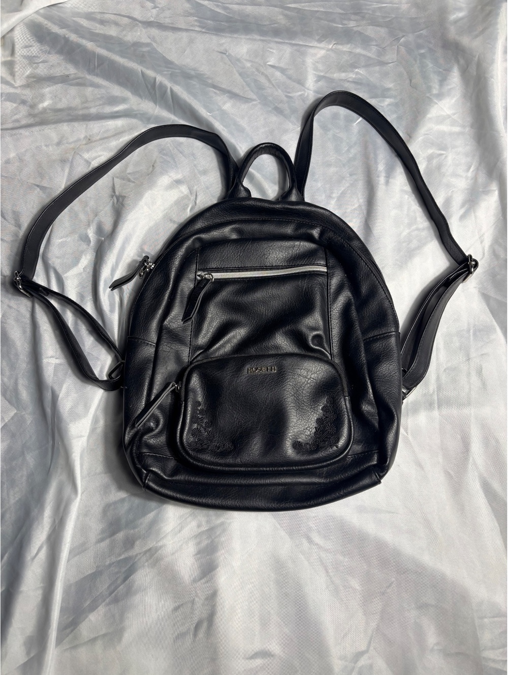 Rosetti Black Faux Leather Backpack with Front Pocket and Z-